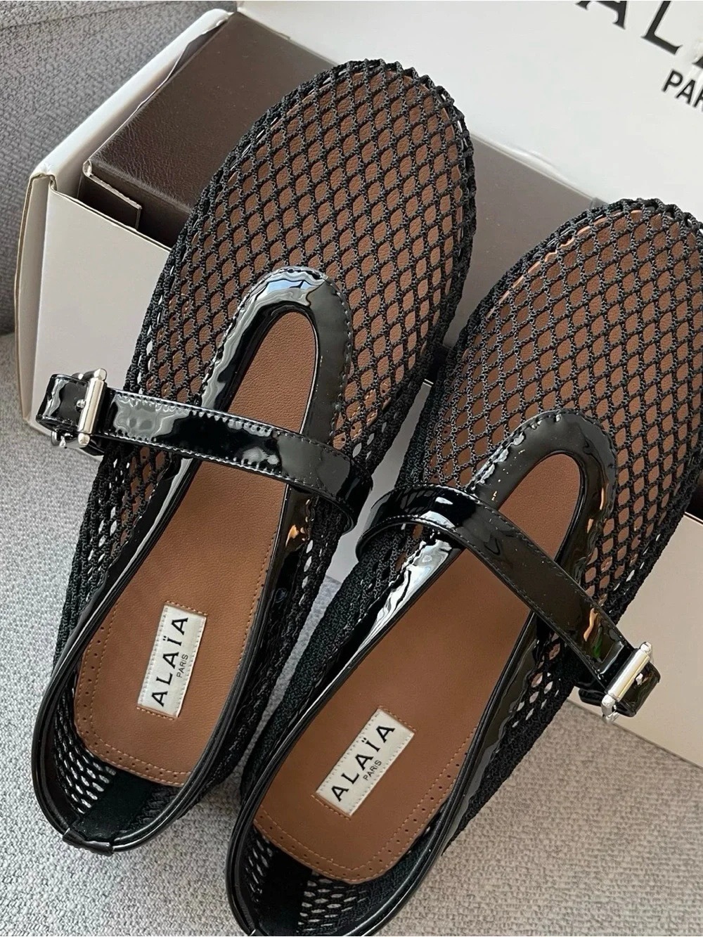 ALAÏA Black Mesh Patent Leather Mary‑Jane Flat Shoes